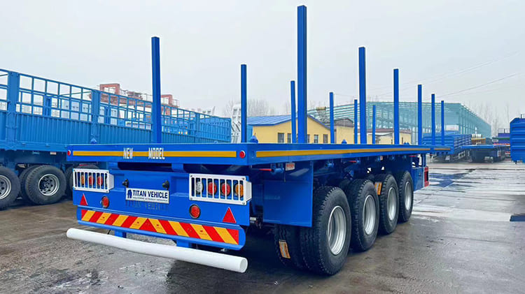 4 Axle Semi Truck Flatbed Trailer for Sale in Côte d'Ivoire with Stakes